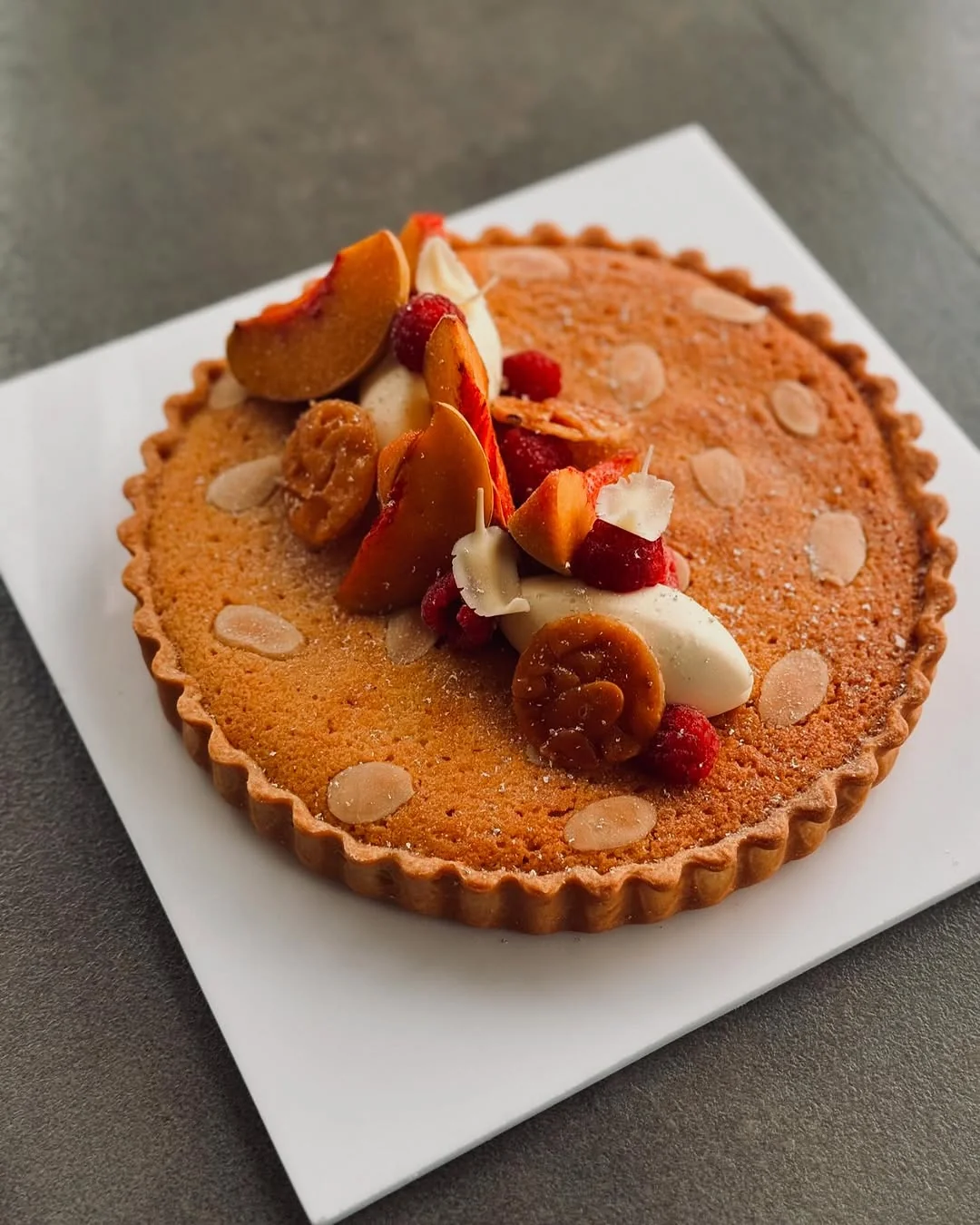 Frangipane & Stone Fruit tart — almond cream, blistered peach and brown-butter pastry with mascarpone quenelle